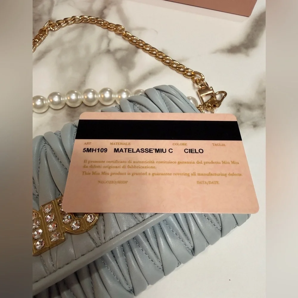 Miu Miu Matelasse Bifold Long Wallet Logo Leather Cielo Blue